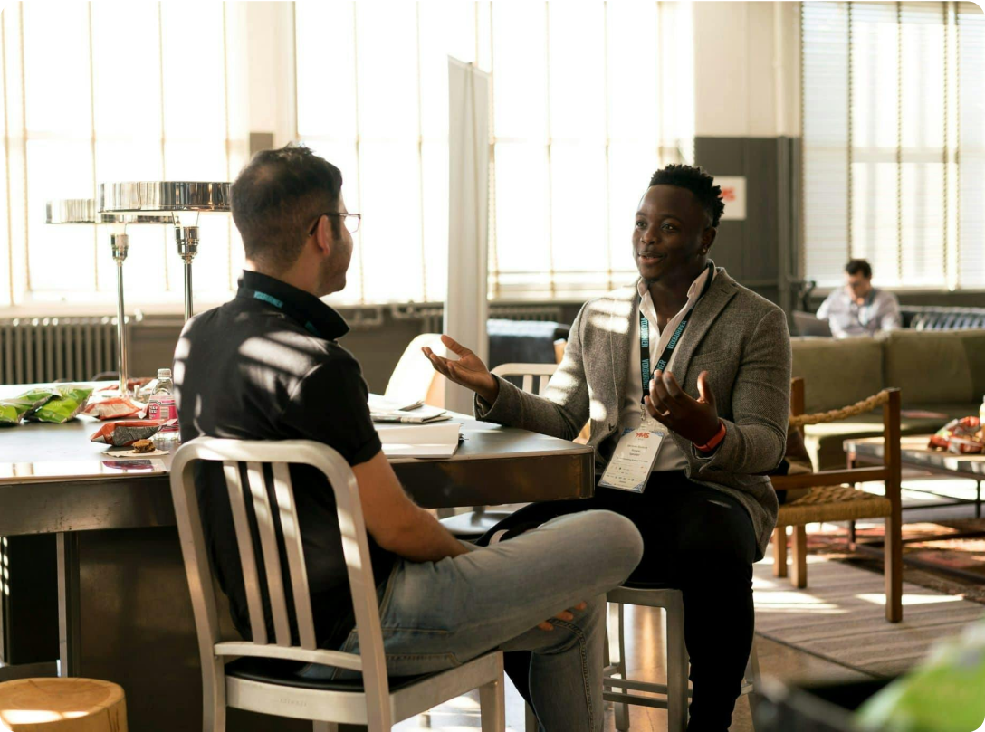 Professional meeting scene with people collaborating